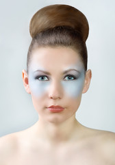 Portrait of sexual beautiful girl with blue make up