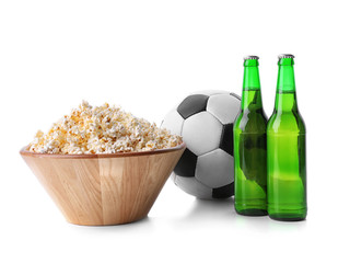 Popcorn, ball and bottles of beer isolated on white