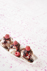 scoops of ice cream with raspberries and jam, good for your menu design