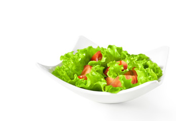 Healthy food background. Vegetable salad with tomatoes in plate