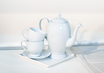 Clean white dishes on the kitchen