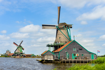 Old traditional windmill on shoreline