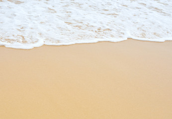 Fototapeta na wymiar Sand beach and wave