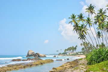 Fototapeta na wymiar beach, tropical sea and stones