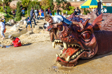 Children on playground of Hampton Court, autumn