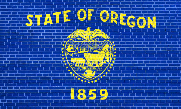 Flag of Oregon on brick wall texture background