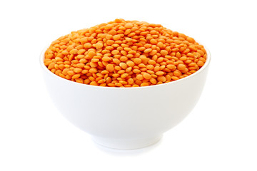 Bowl with red lentils on white