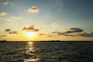 Fototapeta premium Sunset at sea with a beautiful light.