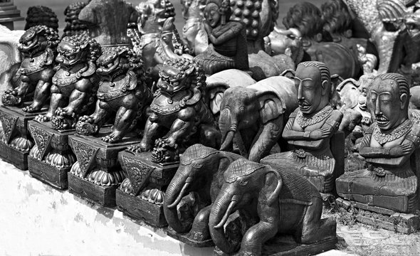 Chinese guardian lions statue, symbol of protection and power in oriental asia Roadside market in Thailand