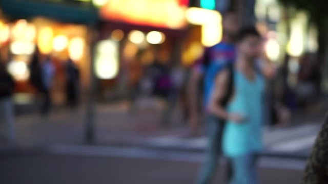 Crowds of Japanese and tourist at night walking at Takeshita street, Harajuku, Tokyo, Japan. 