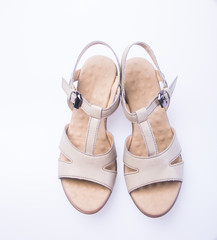 shoe. Brown colour fashion woman shoes on a background.