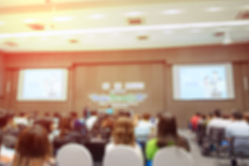 Blurred scene symposium on business in domestic