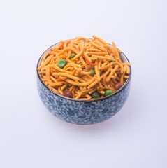 murukku or traditional indian snack on background.