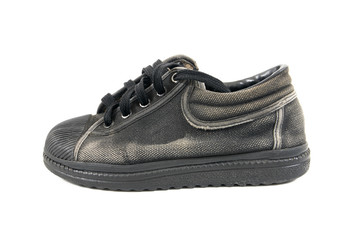 Black old school shoes isolated on white background.Boy school s