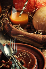 Rustic table setting for Thanksgiving Day: pottery, vintage appl