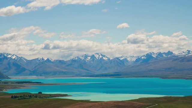 Time Lapse - Ariel View of Lake Tekapo with Mountain Range
