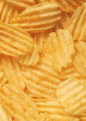 corrugated potato chips in the background