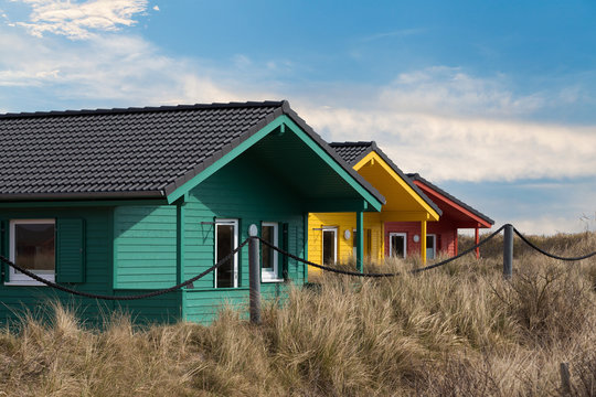 colorful wooden tiny houses on the island