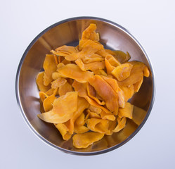 mango dry or dried mango slices on background.