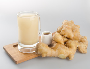 Ginger tea or Ginger tea with haney on background.