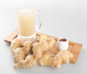Ginger tea or Ginger tea with haney on background.