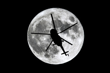 Full Moon helicopter silhouette © Belish