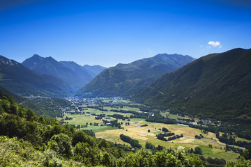 Fototapeta na wymiar Valley and peak of Pyrenean mountains with a blue sky, France