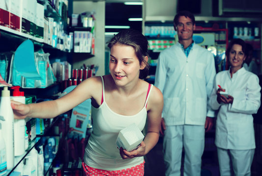 Teenager Girl In Pharmacy