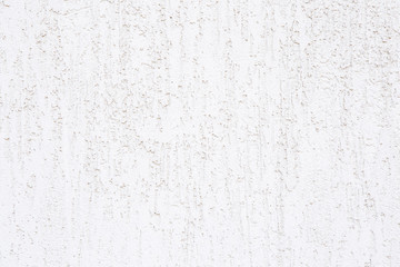 White wall texture background. From down side shine bright light. Focus point in the center.