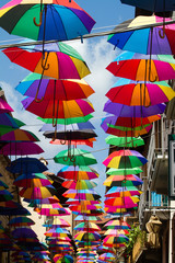 Fototapeta na wymiar Umbrella art installation, colours in the sky.