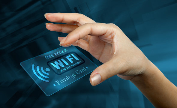 a woman's hand holding  a
digital card with the word free wifi
