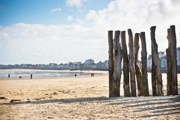 Breakwaters on seashore Saint malo, France