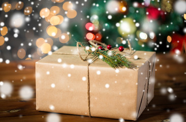close up of christmas gift with fir brunch