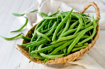 Green beans in a wicker basket © teleginatania