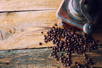 Coffee grinder and beans. Copyspace. Top view