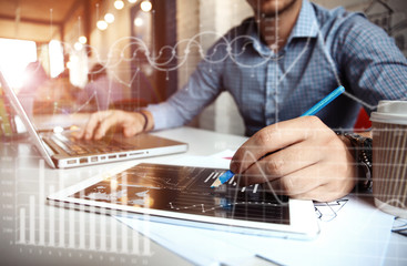 Business adviser analyzing financial figures denoting the progress in the work of company
