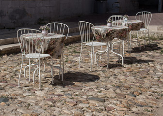 Tables and chairs outdoor cafe