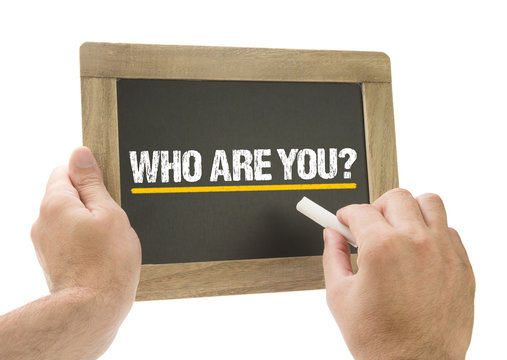 Who are You? Hand writing on chalkboard