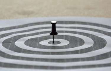 Fototapeta na wymiar black marker boards stab on circle target