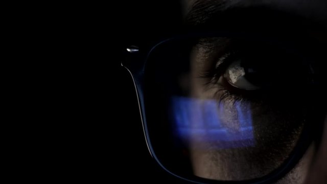 man watching nude content on internet reflection on glasses