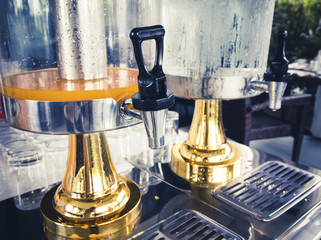 Tanks press cool water in a restaurant.