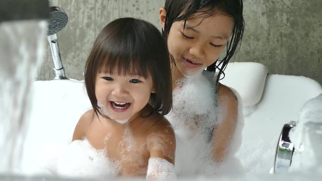 two little baby girl playing together