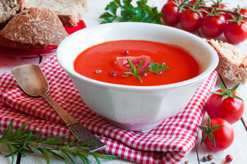 Tomato soup in a white bowl 
