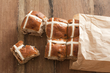 Bag full of fresh hot cross buns