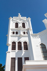 Fototapeta premium White Church Tower on Blue