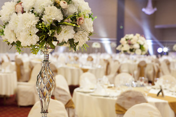 luxury decorated tables in the wedding hall
