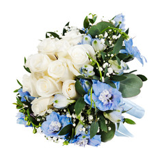 Colorful floral bouquet from white roses and delphinium flowers isolated on white background.