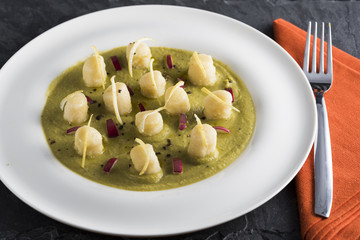 velvety green peas with dumpling, lemon and radicchio