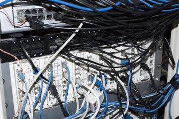 Ethernet Network Switch with ethernet cables blue, green, gray