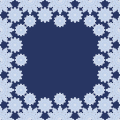 Repeating white snowflakes silhouette pattern on the blue background. Border frame with space for text. Christmas and Happy New Year symbol concept